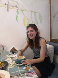 Drinking coffee at a café in Hangzhou.