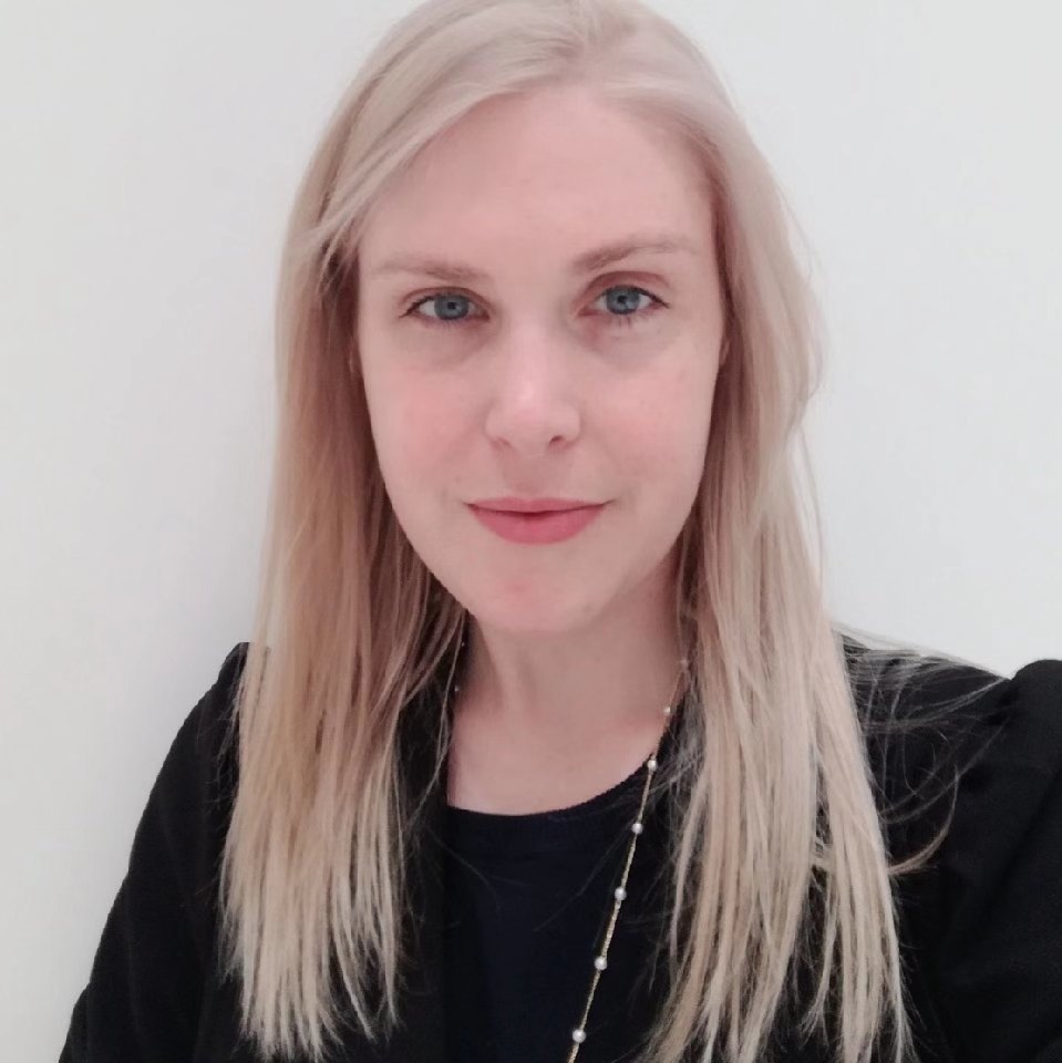 Portrait of Rebecca wearing a black top