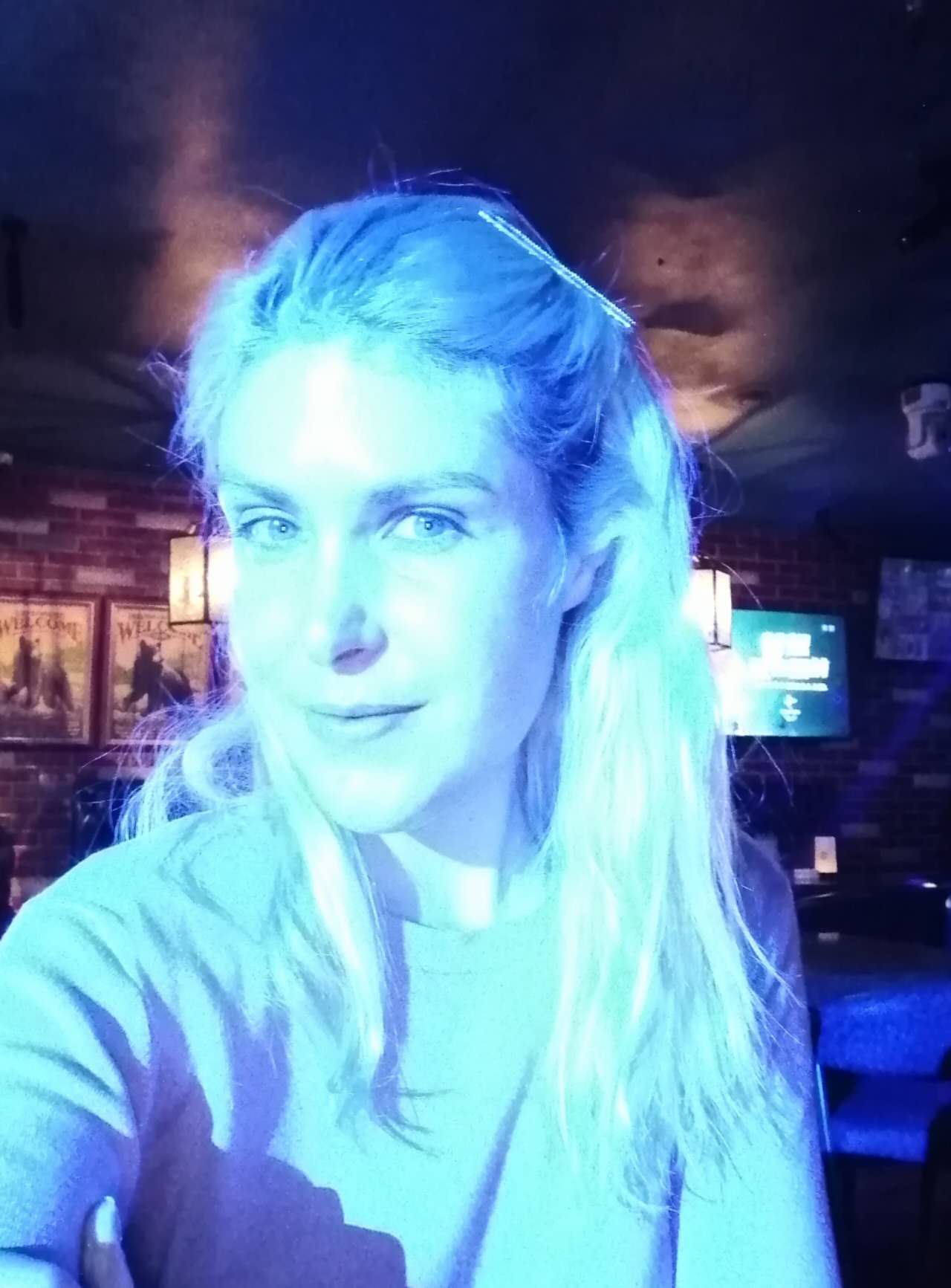 Rebecca photographed under blue lights